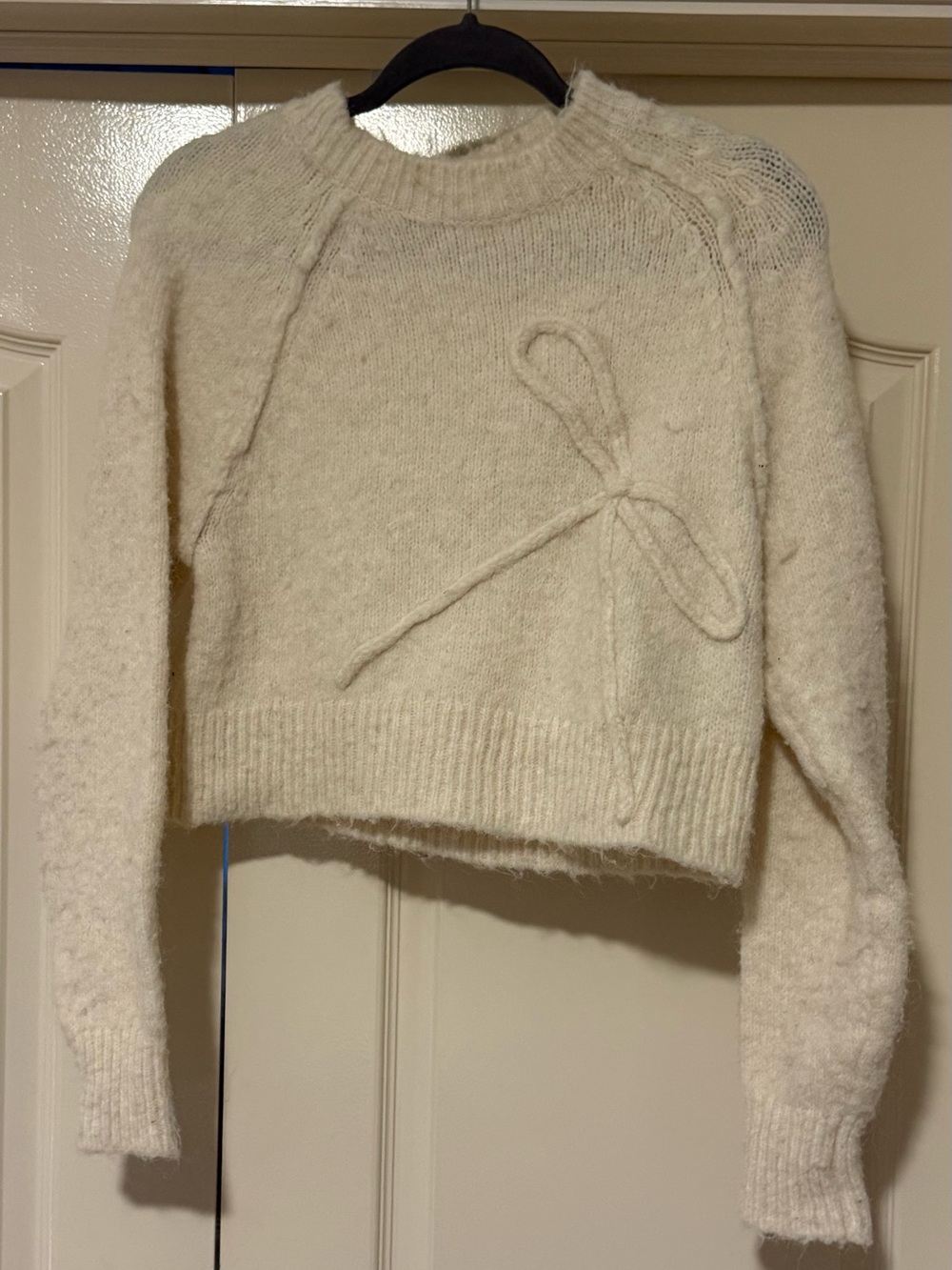 American Eagle Outfitters Cream Crewneck Sweater with Bow Detail